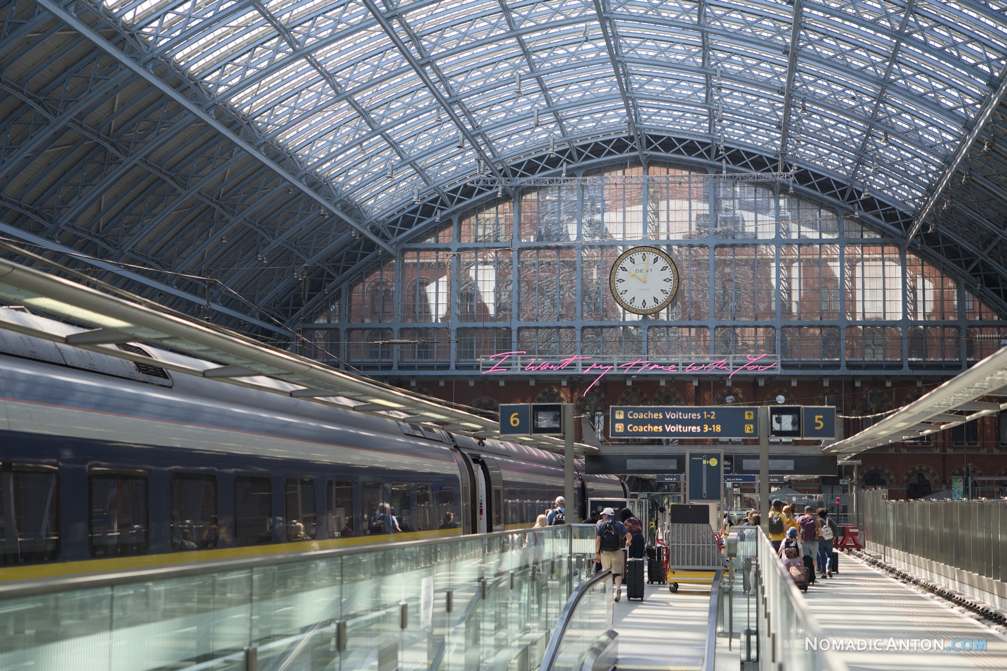 Eurostar train and platforms under the glass roof of London St Pancras International